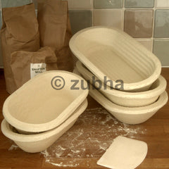 Long Oval wood pulp bannetons on worktop, 500g and 1kg sizes, various patterns